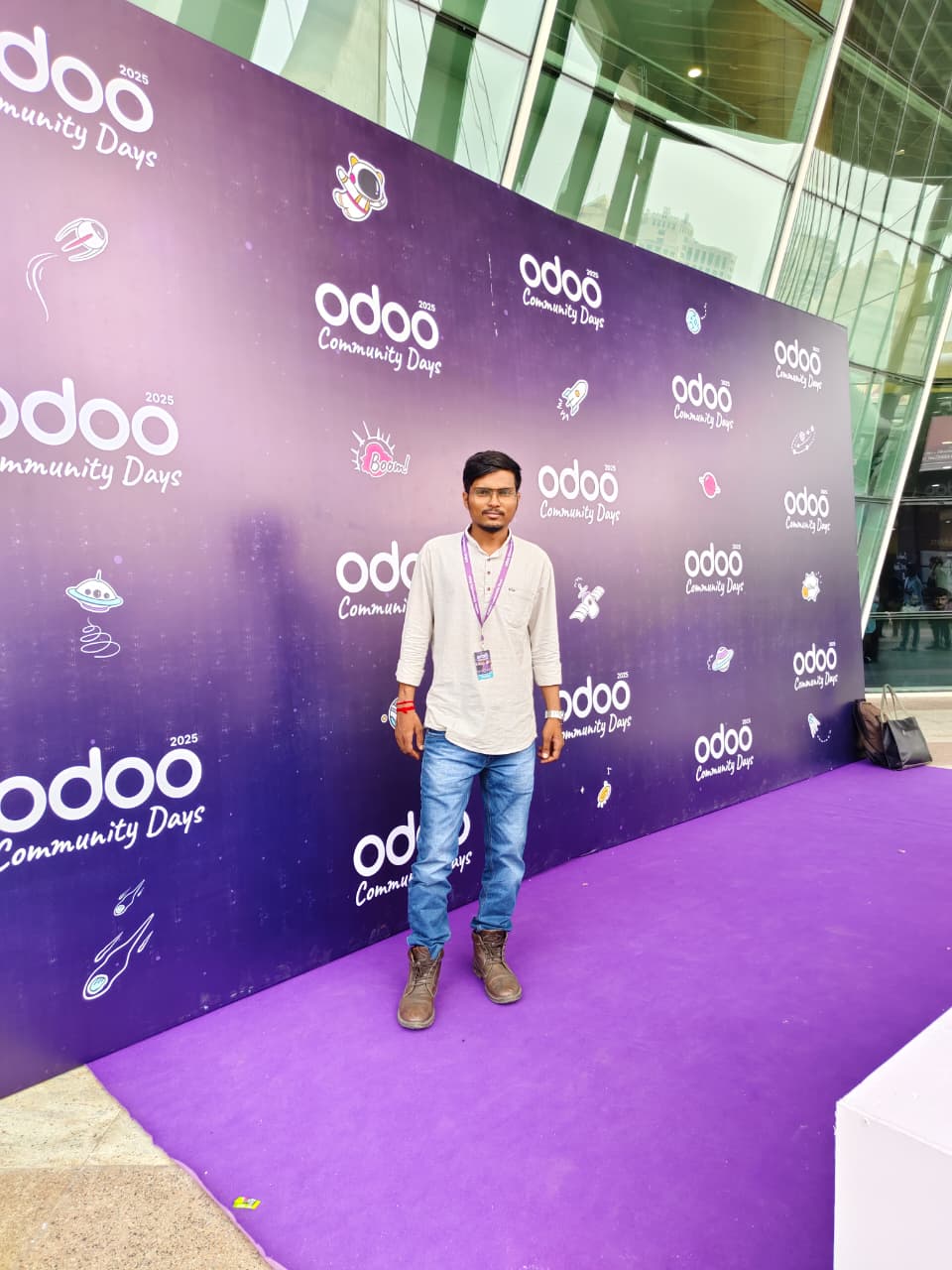 Jayendrasinh at the Odoo Community Days 2025 backdrop